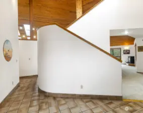 Gracious curved stairs up to the bonus area