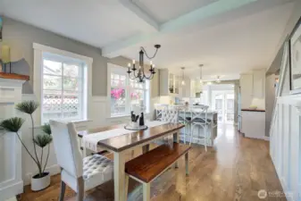Open floor dining area, leads to kitchen.