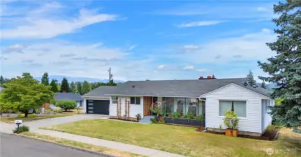 Vintage 50's rambler with walk-out basement. Tastefully updated with flexible floor plan offers great space for multi-generation living.