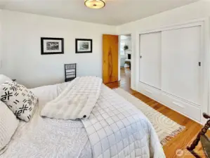 Another view...love the built-in closet with drawers below.