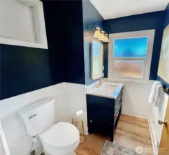 Completely updated main floor powder room.