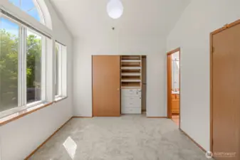 East-facing bedroom with closet insert and ensuite bathroom.