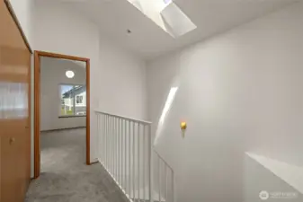 Upstairs hallway, looking west. Laundry closet is to the left.