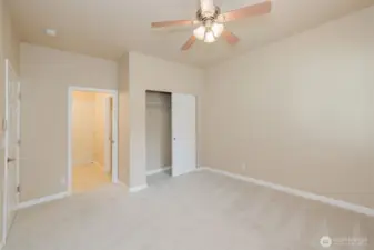 Primary suite with walk-in closet and private bath access