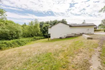 Level lot with plenty of outdoor space for entertaining or play