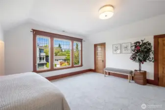 large primary bedroom with 2 closets