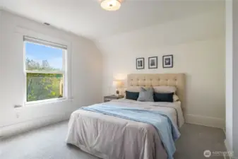 one of three upstairs bedrooms - this one with a peek-a-boo view of Mt. Rainier