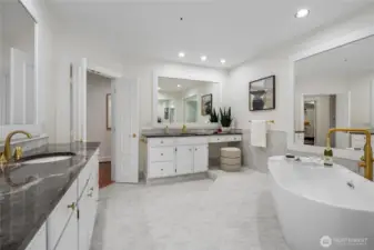 Two separate vanities provide plenty of space