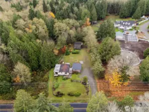 Plenty of privacy on this acreage- surrounded by trees!