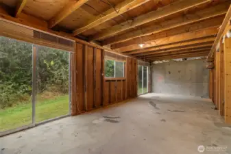 Daylight basement with 2 slider doors to access outdoors