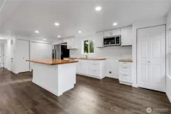 All new flooring, lighting, cabinets, appliances, fresh paint!