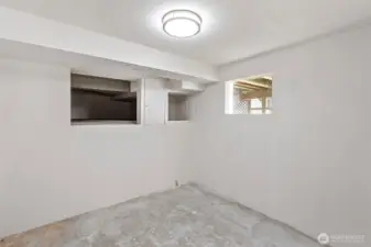 Additional storage room offering versatile space.