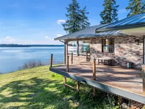 Outdoor deck accessible from the kitchen with panoramic views.