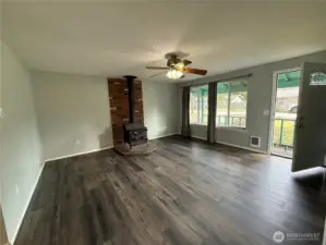 Livingroom with great lighting and wood stove