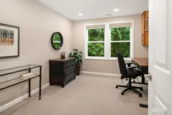 The 2nd BR doubles as an office, has 2 closets, and has newer wool flooring and paint. Its location is just opposite the Guest Bathroom so this side of the condo can act like a 2nd Primary Suite.