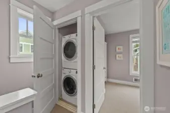 The laundry closet is functional and great for long or short stays at the beach!