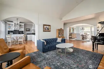 Living room looking into kitchen and into dining room. Perfect entertaining floor plan.
