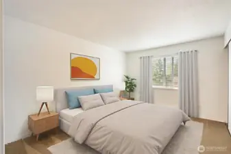 Primary bedroom spacious with large. double closet. Virtually staged