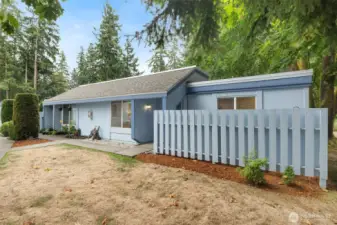 Gorgeous single-level townhome style condo in a beautiful park-like setting!