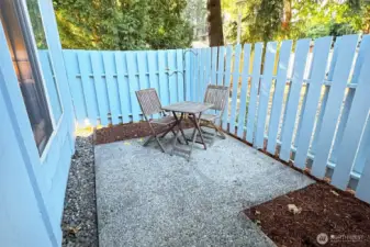 Private fenced patio and garden area