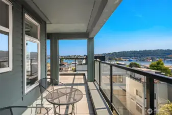 Enjoy lake, mountain & city views from huge covered wrap-around deck