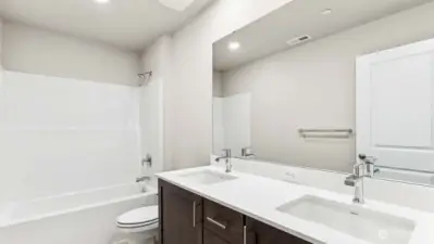 2nd floor main bath with dual sinks.