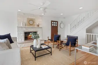 View of the living room from the dining room. Door is on the north side of the house.