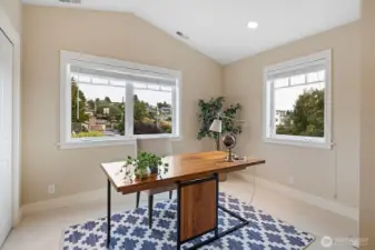 Upstairs, a dedicated office space offers versatility and storage with three large closets. Bright and private, it can also function as a nursery, home gym, or flex room to suit your needs.