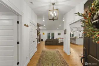 Welcoming entry with dedicated office to your left and formal dining to your right.