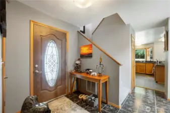 Entry way front door with view into the kitchen space.