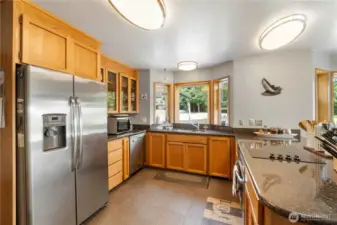 Well organized kitchen area.  Counter top is granite.