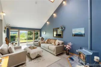 Living room has propane gas stove.  Primary heating and cooling in home is provided by heat pump.