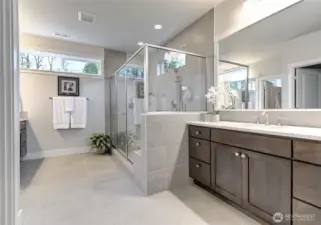 The suite features a spa-like 4-piece bath and custom built-in closet.