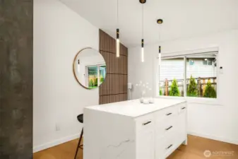 Oversized quartz island with double waterfall edges