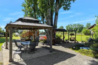 ~Relax in your Gazebo w/ Gorgeous Pavers & Graveled all around~ Listen to the sound of the Waterfall & watch the variety of Birds flying in & out~