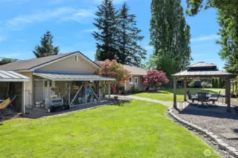 ~Back of Home with Covered Kennel Area measuring 20 Ft by 6 Ft~
