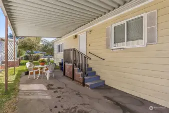 Nice covered area to enter the home.