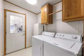 Bright and spacious mudroom with laundry