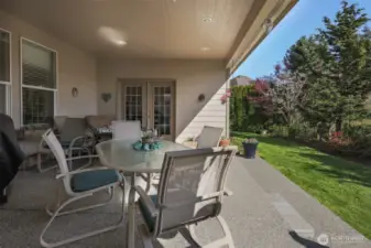 Spacious Covered Patio with access From Both the Primary Bedroom and the Family Room
