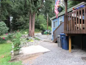 Wooded area across street from Home / Parking area, across private driveway.