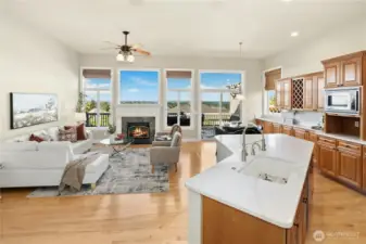 VIEW great room is a bright and airy space with gas fireplace for cozy Fall and Winter days