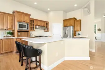 Gorgeous kitchen with new quartz, appliance garage, 50k BTU Italian range, walk-in pantry!