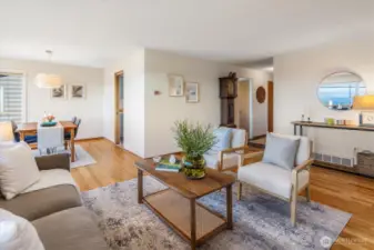 The open layout flows from the Living Room into the Dining area.