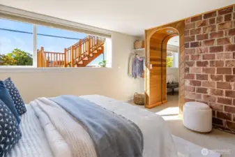 A fourth bedroom on the lower level also captures beautiful natural light.