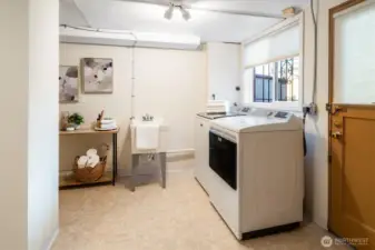The lower level laundry room is spacious and well organized.