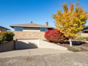 The wide two-car garage also provides plenty of off-street parking in the driveway.