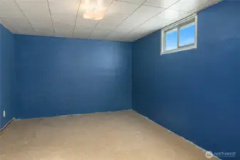 3rd, non-conforming bedroom in basement.