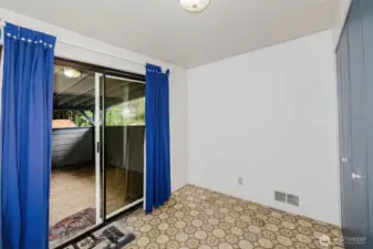 Dining space with access to laundtry.