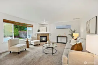 This family room is where it's at! Large space and cozy fireplace