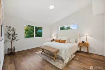 Primary room is a SUITE! Vaulted ceilings, bright window light, retreat in peace and rest